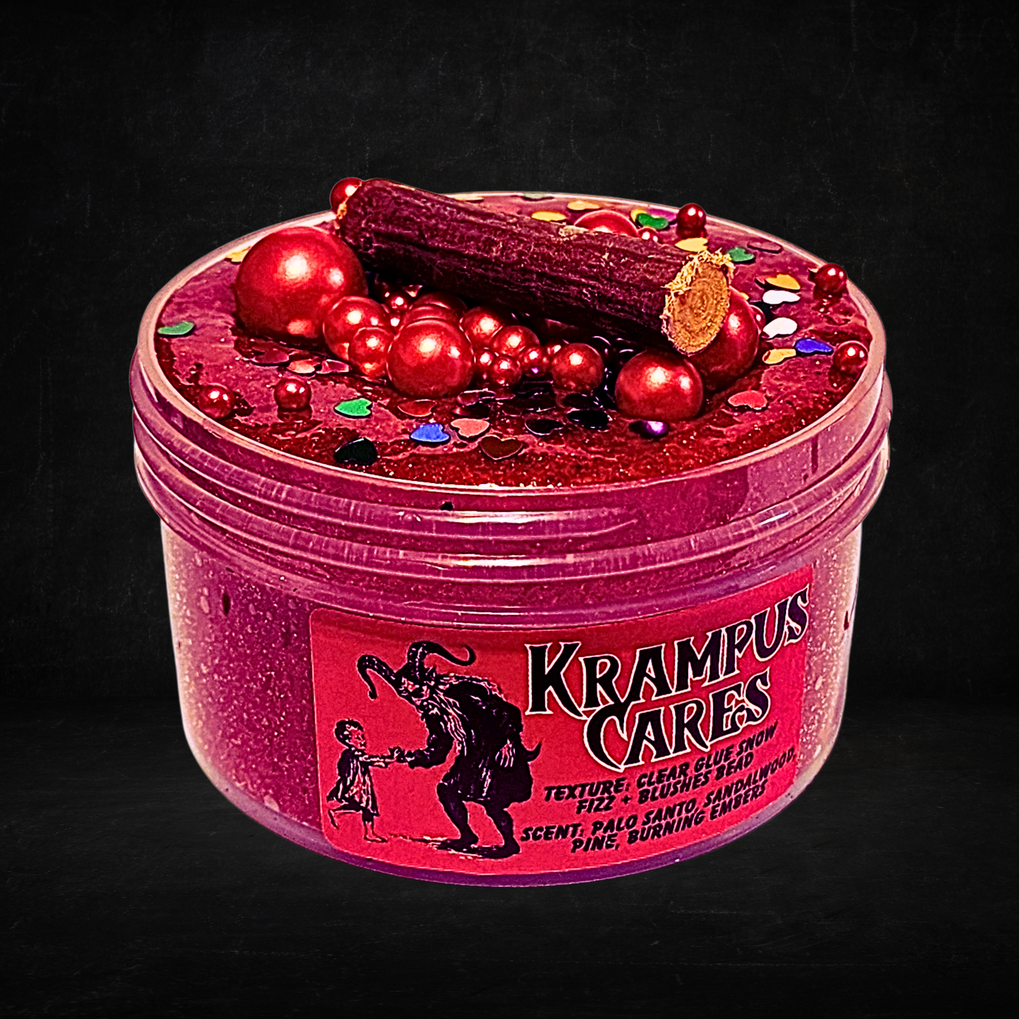 Krampus Cares – Snow Fizz Slushee Bead Slime (6oz) | Metallic Red Balls | Birch Stick Topper | Palo Santo & Embers Scent